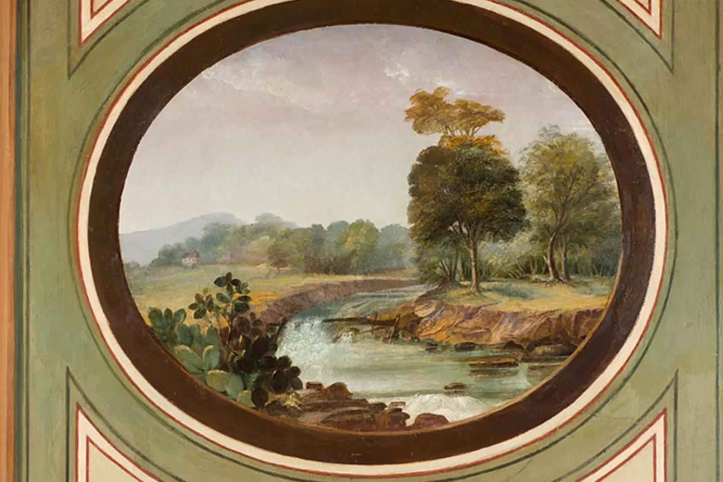 An oval medallion of landscape painted in the Brumidi Corridors.