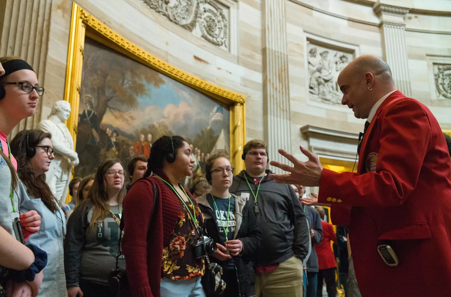 A tour with guide in the U.S. Capitol Rotunda.