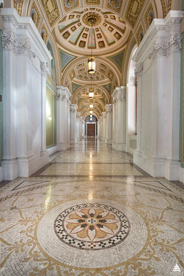 A hallway in the Library of Congress Thomas Jefferson Building with ornate walls, ceiling and floor.