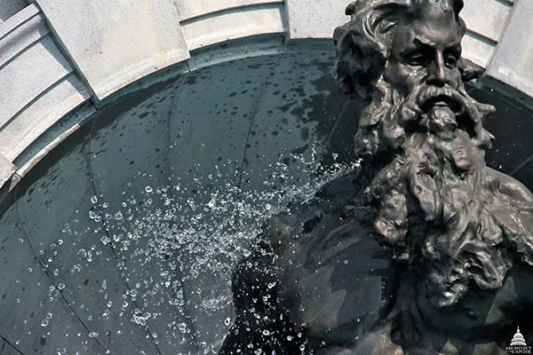 Detailed look at the Neptune sculpture element of the fountain at the Thomas Jefferson Building in Washington, D.C.