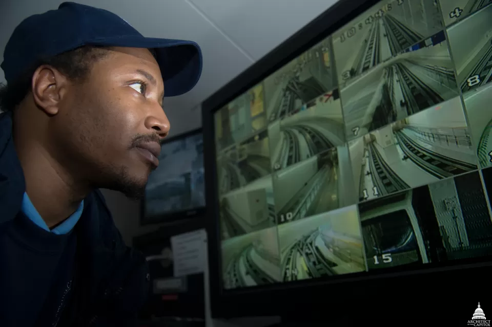 Erick Gage views the automated subway system to the Hart and Dirksen Buildings from a nearby control room. Staff continuously monitor the system so they can prevent many problems and respond quickly whenever they occur.