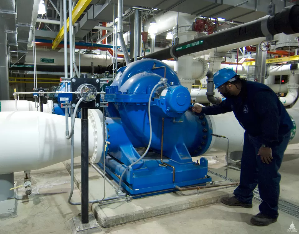 An AOC Capitol Power Plant employee inspects the equipment to ensure it is reliable every day of the year.